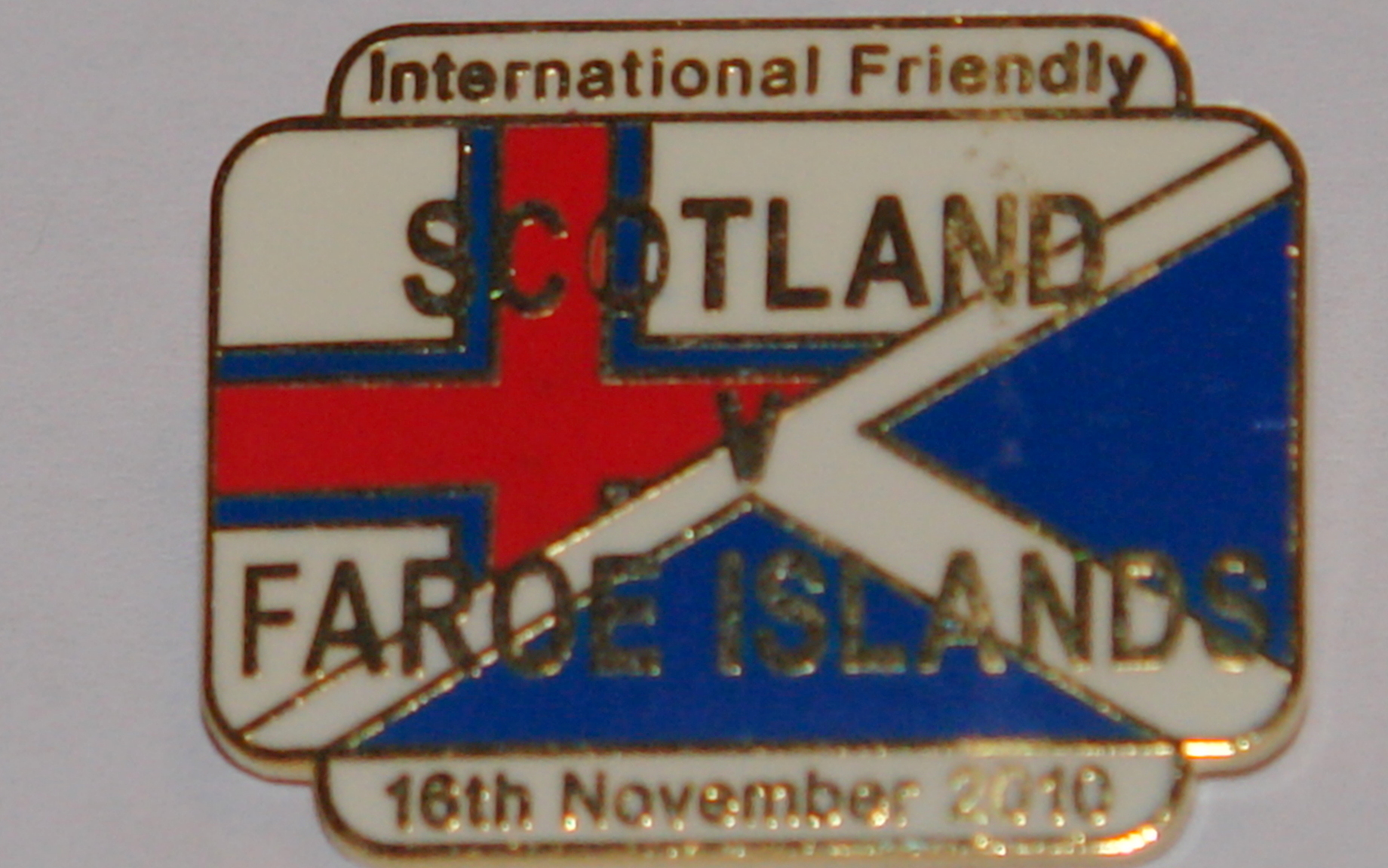 scotland v faroe islands 2010 friendly badge no 46 - Scottish Football Memorabilia