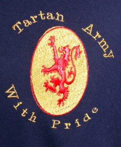 dark blue tartan army badge